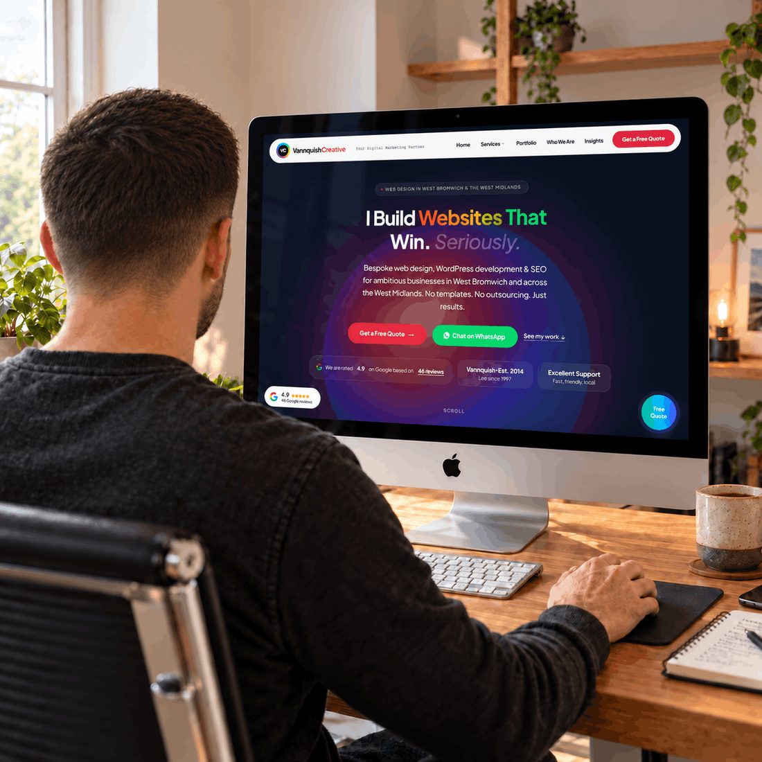 Lee, founder of Vannquish Creative, working at his desk